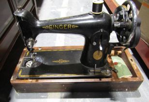 Vintage Singer table top sewing machine in domed wooden case
