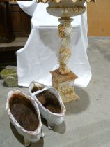 Cast iron birdbath, painted white on square pedestal supported by cherub ( 85 cm h.)and two two oval