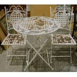 Metal cream painted garden table, circular, decorated with flowers and butterflies, two matching