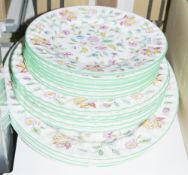 Quantity of Minton Haddon Hall pattern tablewares to include dinner plates, side plates and three