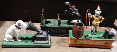 Cast iron 'Show Jumper' money box, a cast iron 'Trick Dog' money box and a cast iron model of HMV