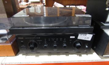 A TEAC AR-630 integratedc amplifier with a Pioneer PL225 turntable