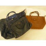 Longchamps brown leather tote bag, a Longchamps blue calf leather holdall, and a Longchamps