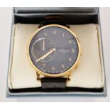 Modern Skagen Connected wristwatch, the circular dial having Arabic numerals denoting hours,