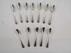 Set of twelve George III silver teaspoons, having bright cut decoration, hallmarked London 1786 by