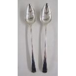 Pair of George III silver gravy/basting spoons, rat tail handles, hallmarked London 1806, by William