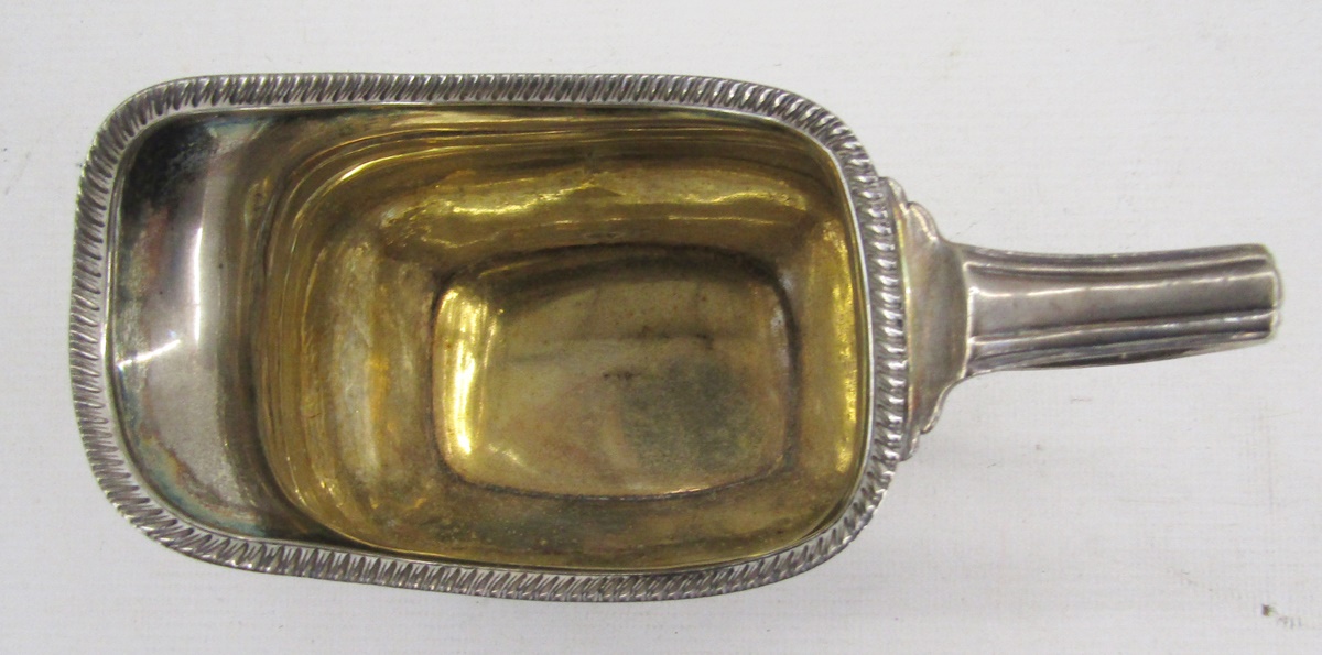 George III silver pouring jug, with reeded border, raised on four bun feet, hallmarked London - Image 4 of 5