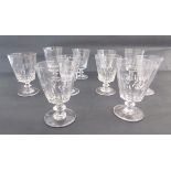 Assembled set of 10 cut glass rummers, variously cut with lappets above knopped stems and
