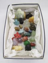 Collection of coloured hardstone and similar precious stone models of Buddhas, including