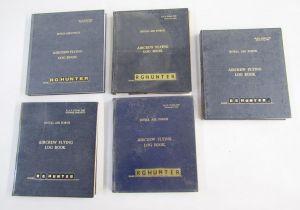 Five Royal Air Force air crew flying log books for R G Hunter from 1960s to 1990s