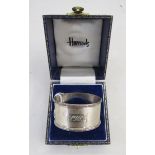 20th century silver napkin ring, oval form with engine turned decoration, hallmarked Birmingham