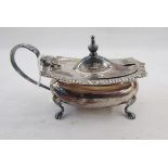 Silver salt, rectangular with gadrooned and foliate everted rim, on scroll supports, the matching