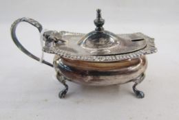 Silver salt, rectangular with gadrooned and foliate everted rim, on scroll supports, the matching