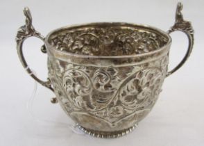 Late Victorian silver twin handled sugar box, with repousse scrolling acanthus leaf decoration