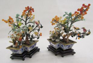 Pair of Chinese enamel hardstone mounted trees, each mounted with a painted tall bird set with