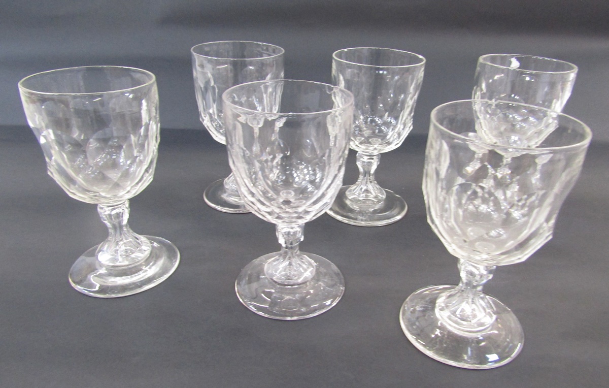 Six cut-glass large water goblets, probably early 20th century, each bowl cut with diamonds and