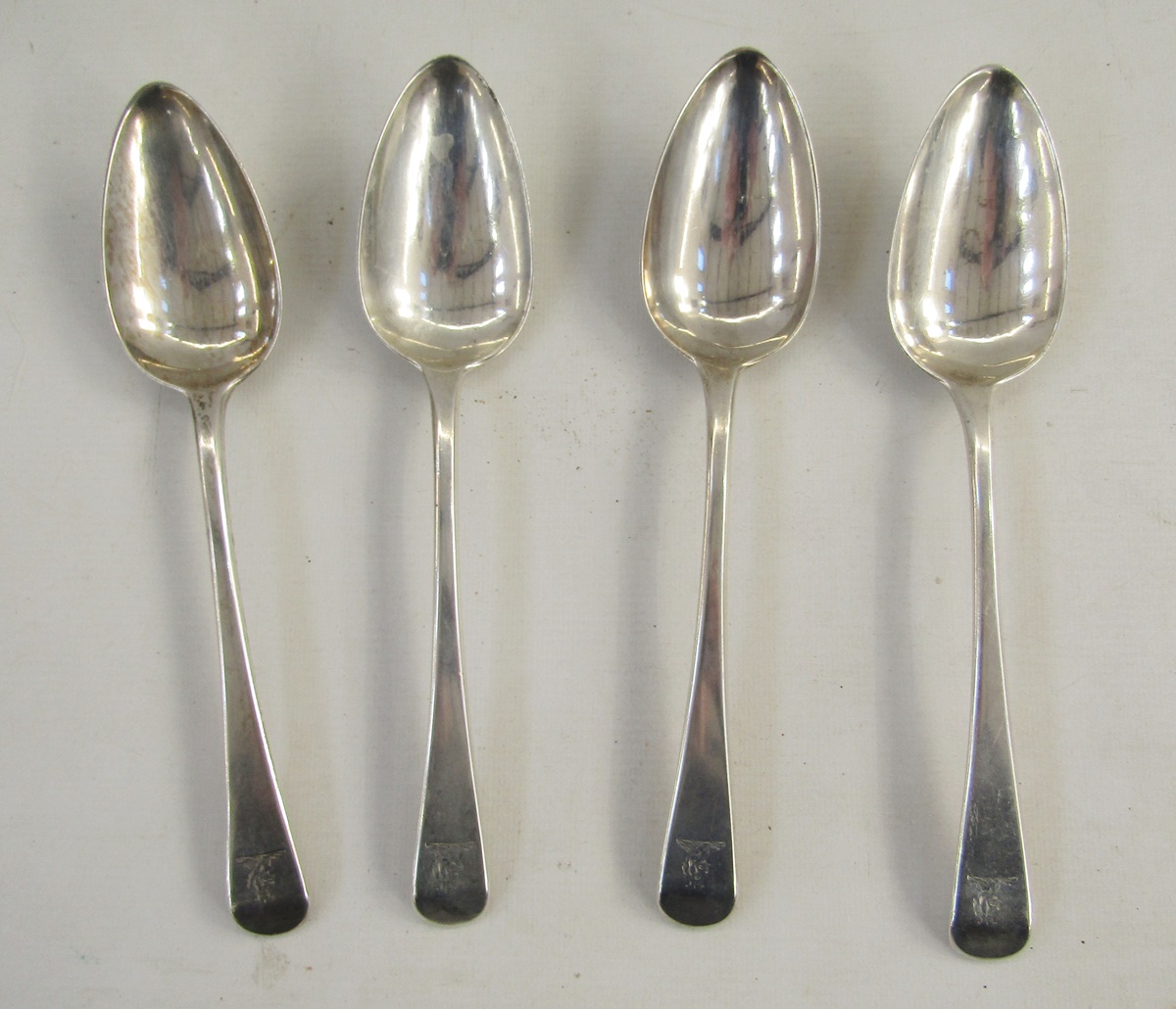 Set of four George III silver tablespoons, with rat tail handles, hallmarked London 1801, by Richard