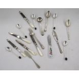 Four 20th century silver coffee bean topped spoons by Mappin & Webb, together with a selection of