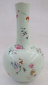 A Chinese porcelain celadon-ground bottle-shaped vase, underglaze blue apocryphal Yongzheng seal