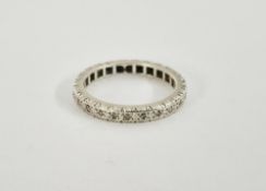 White gold-coloured metal and white stone full eternity ring size L