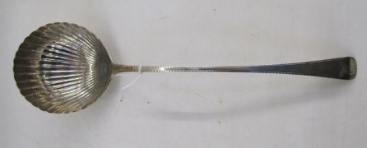 Georgian silver sauce ladle, the bowl shaped as a scallop shell, bright cut handle, hallmarks