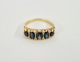 18ct gold, sapphire and diamond dress ring set five blue stones interspersed with small diamonds