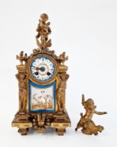 Late 19th century French Sevres-style gilt metal and porcelain mounted mantel clock surmounted