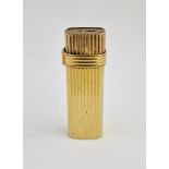 Christian Dior lighter, gold-coloured and ribbed