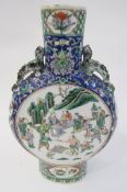 Chinese porcelain famille verte moonflask, 19th century, with pierced beast handles, painted with