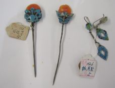 Two Chinese late Qing Dynasty turquoise enamel hairpins, together with a pair of pierced lozenge-