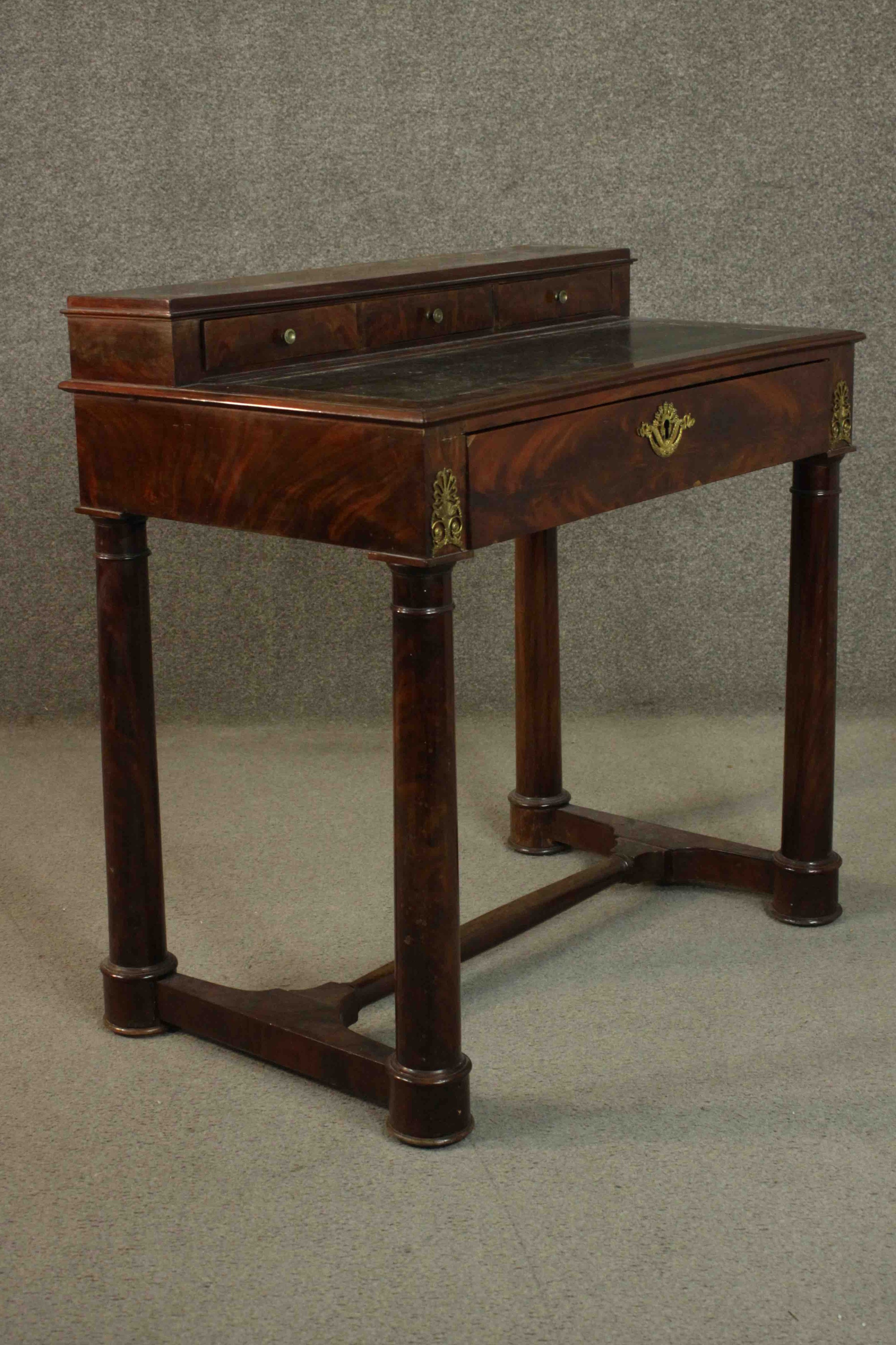 A French Empire flame mahogany writing table, the superstructure with three short drawers, over a - Image 4 of 9