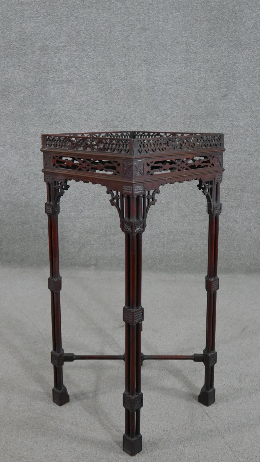 A late Victorian Chippendale style mahogany jardiniere stand, the square top with a pierced - Image 2 of 6