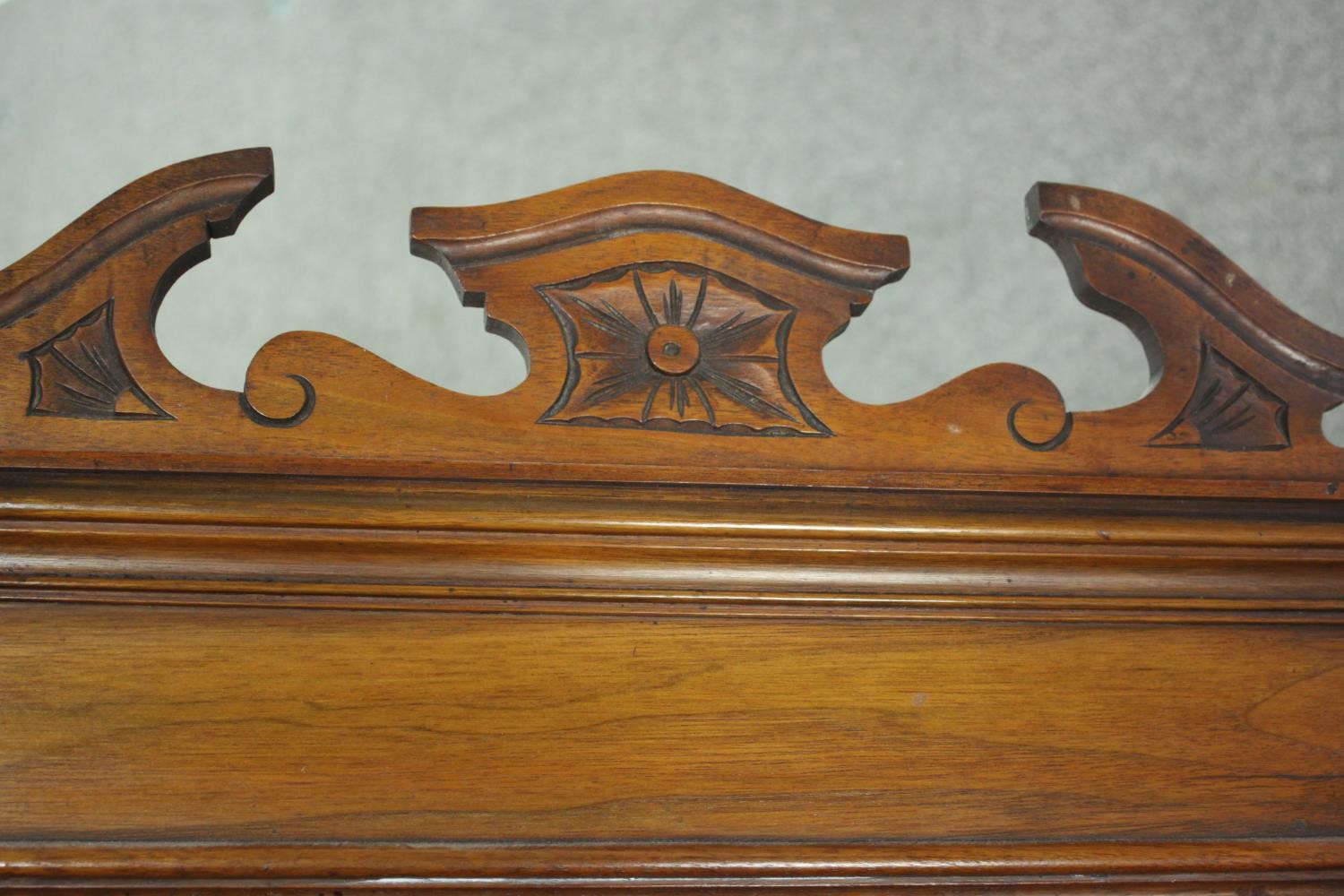 A late Victorian walnut dressing chest, with a central bevelled swing frame mirror, flanked by two - Image 11 of 11