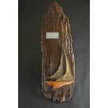 A mid century driftwood plaque with a string art schooner and metal dedication plaque. H.60 W.20cm.