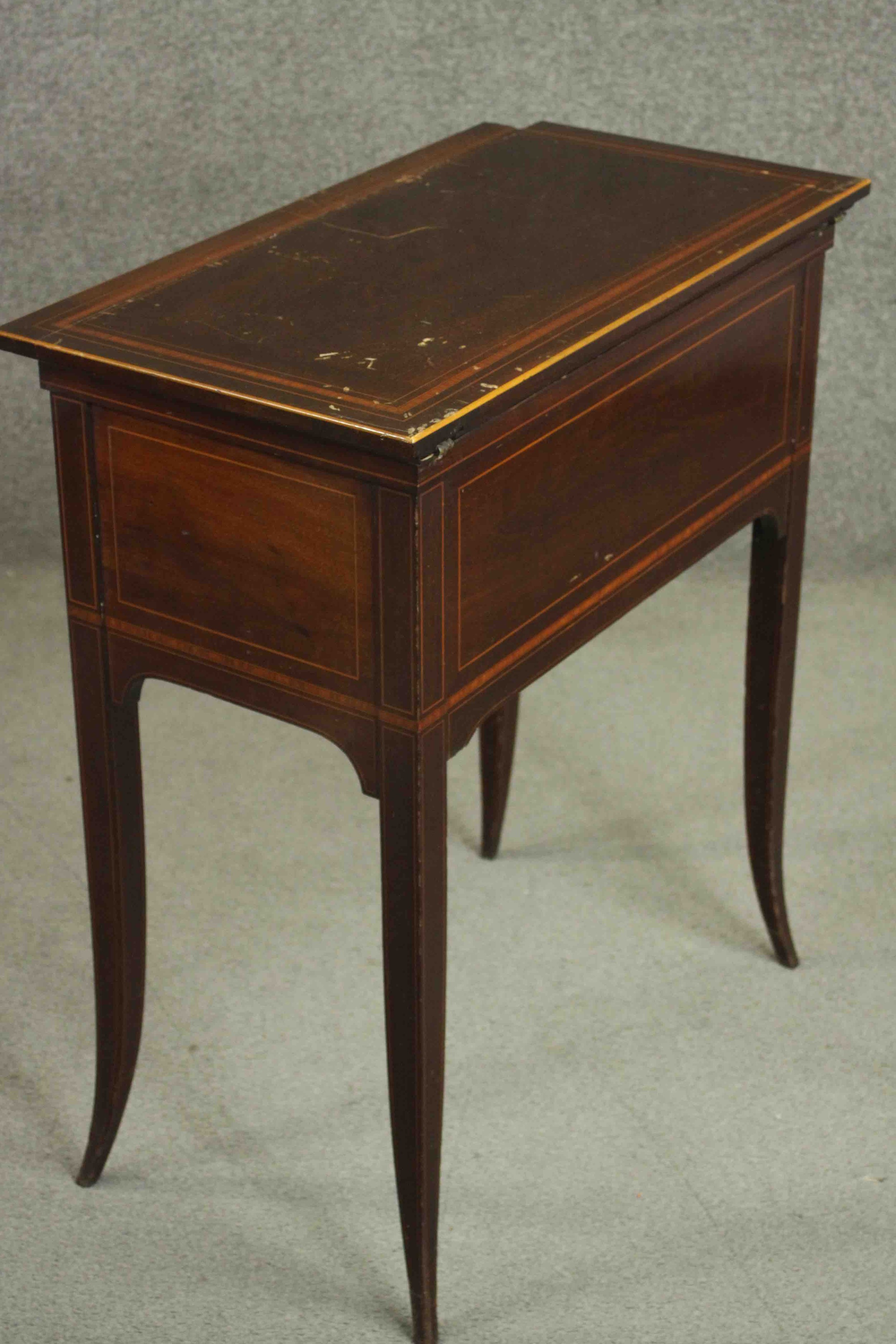 A circa 1900 mahogany and satinwood inlaid writing table, of rectangular form, the top opening to - Image 5 of 9