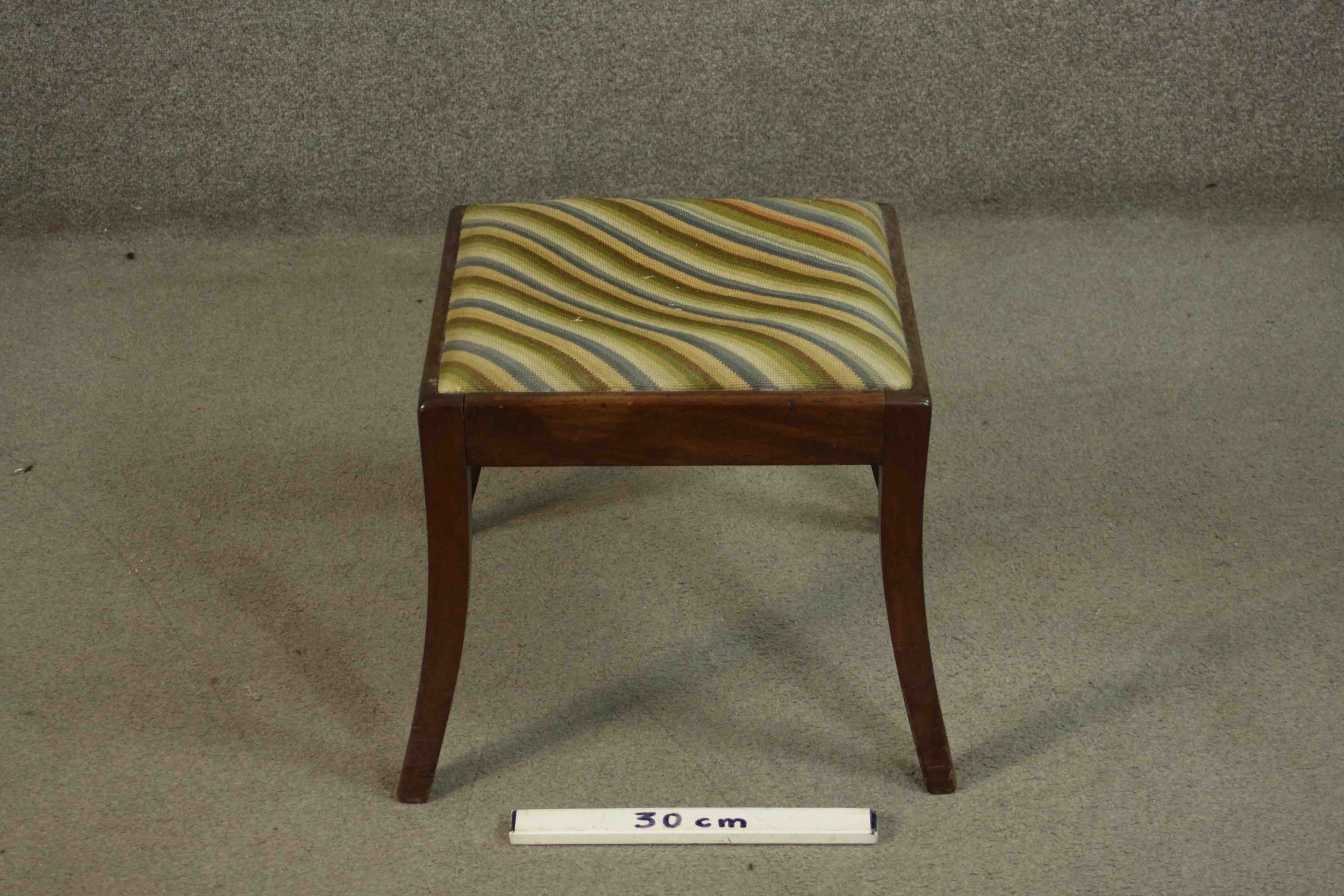 An early 19th century mahogany stool with drop in tapestry seat on sabre supports. H.38 W.42 D.42cm. - Image 2 of 6