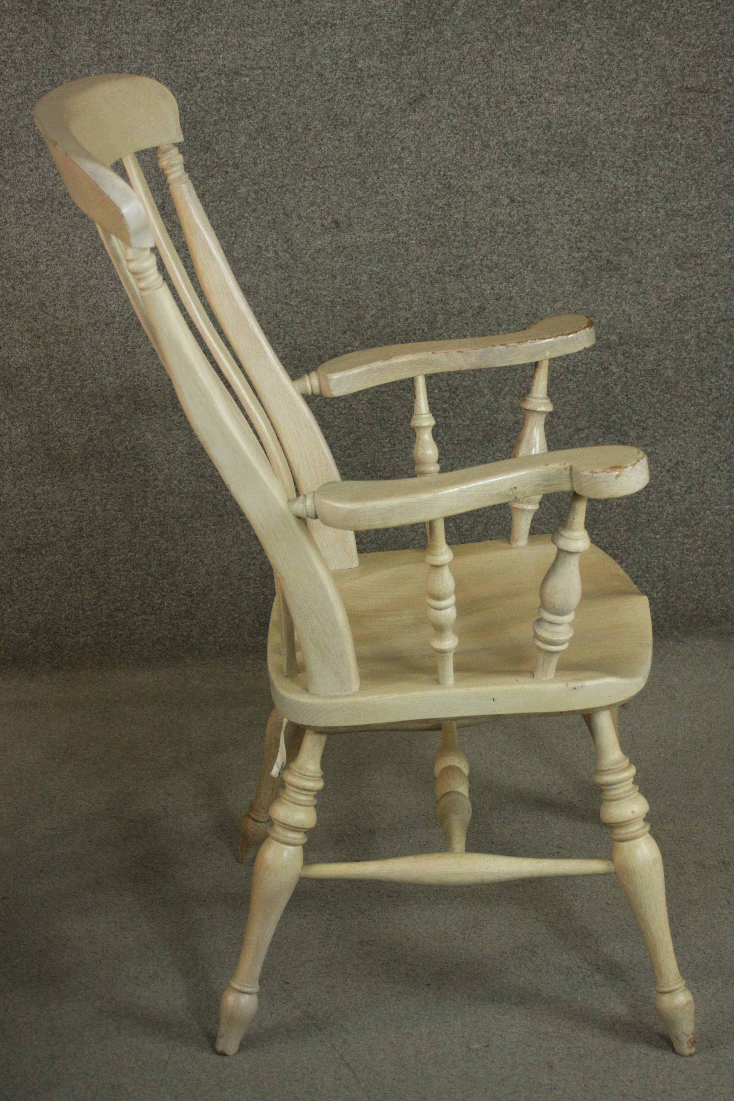 A pair of late 20th century oak Windsor carver chairs, with a comb back above a shaped seat on - Image 5 of 10
