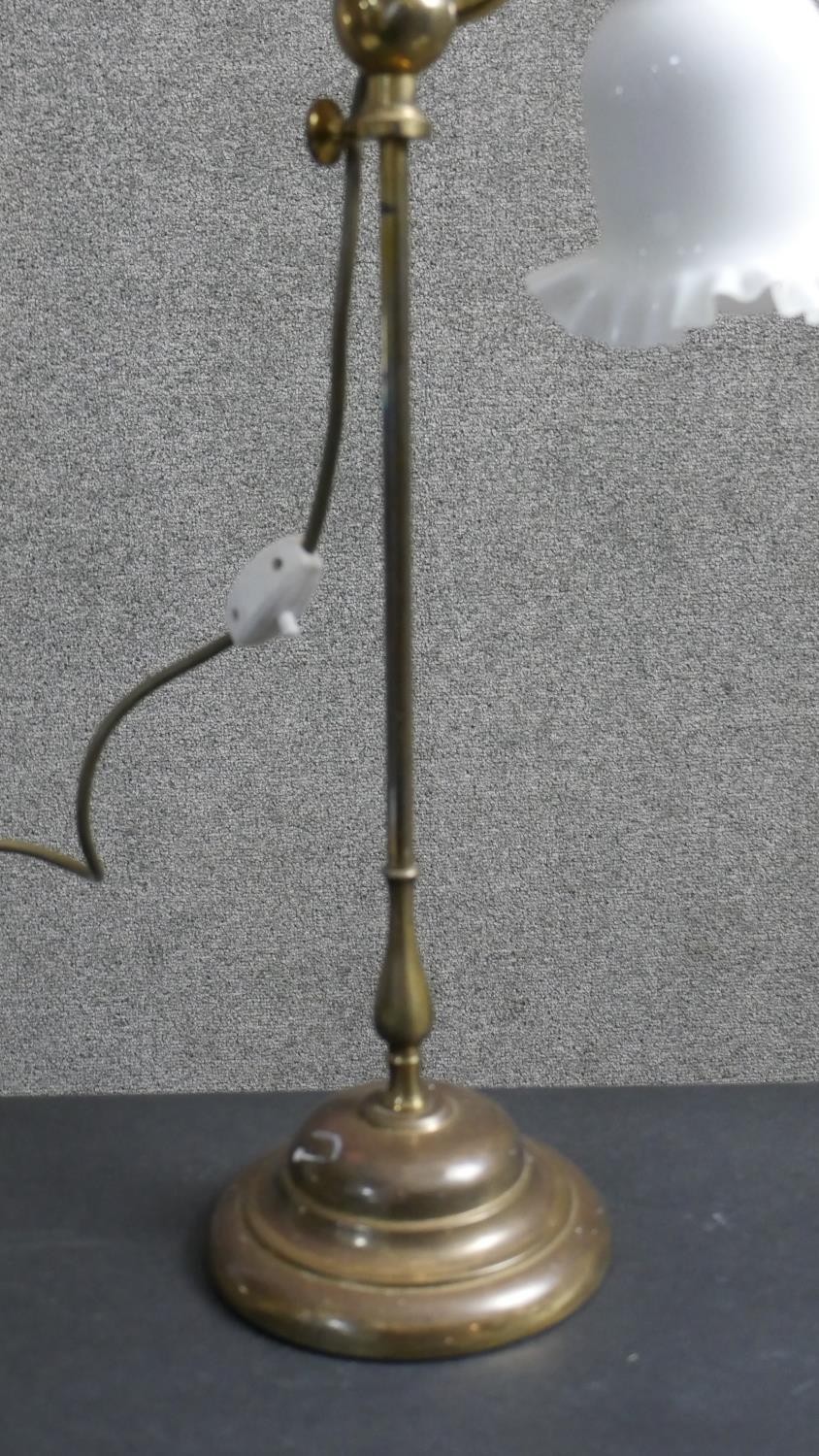 An early 20th century brass student's lamp with handle on a moulded circular base. The bell form - Image 6 of 6