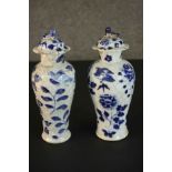 Two Chinese lidded blue and white hand painted porcelain jars. Decorated with flowers and birds