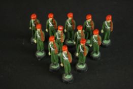 A set of twelve early 20th century painted clay and wire Indian soldiers. H.6.5cm.