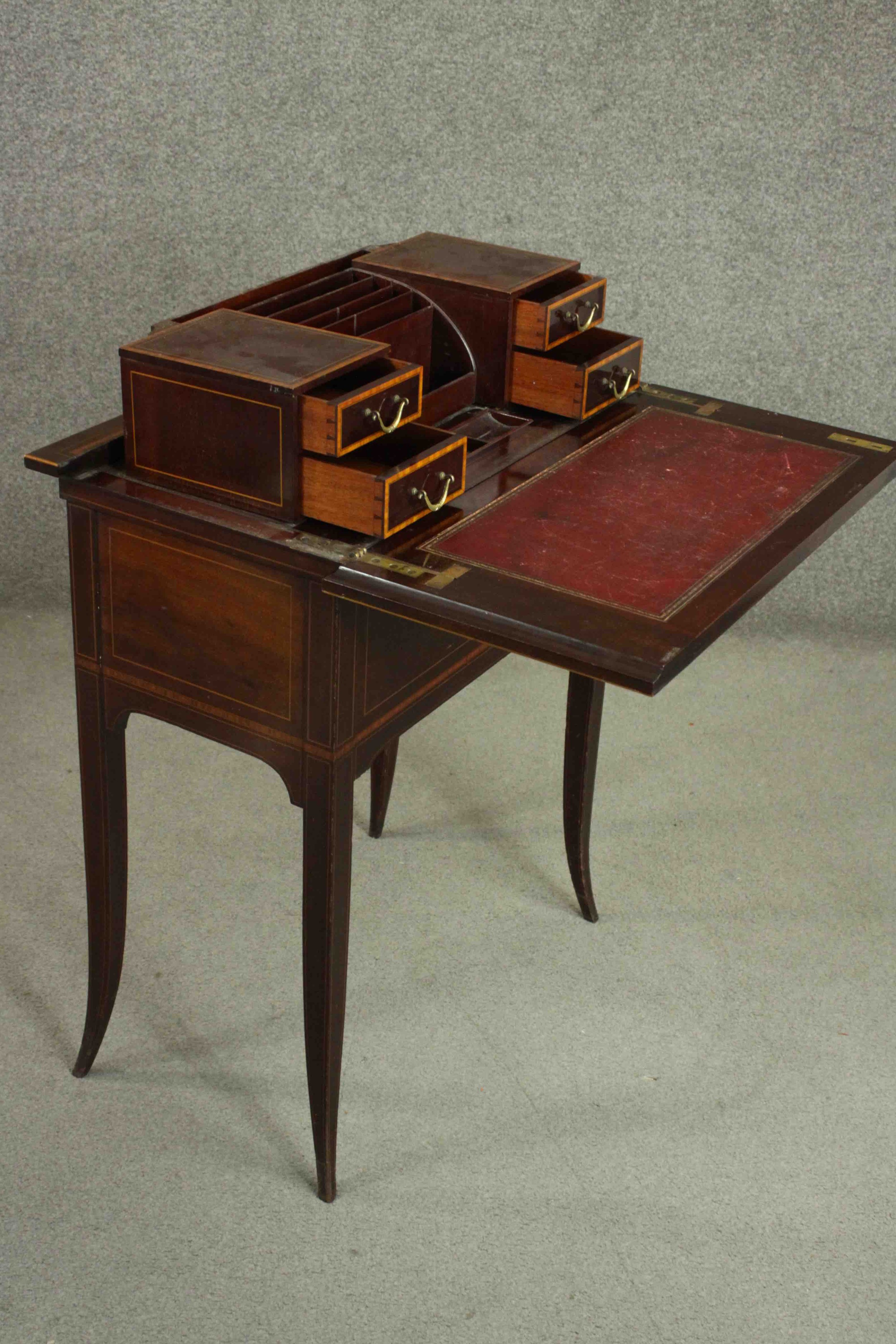 A circa 1900 mahogany and satinwood inlaid writing table, of rectangular form, the top opening to - Image 3 of 9