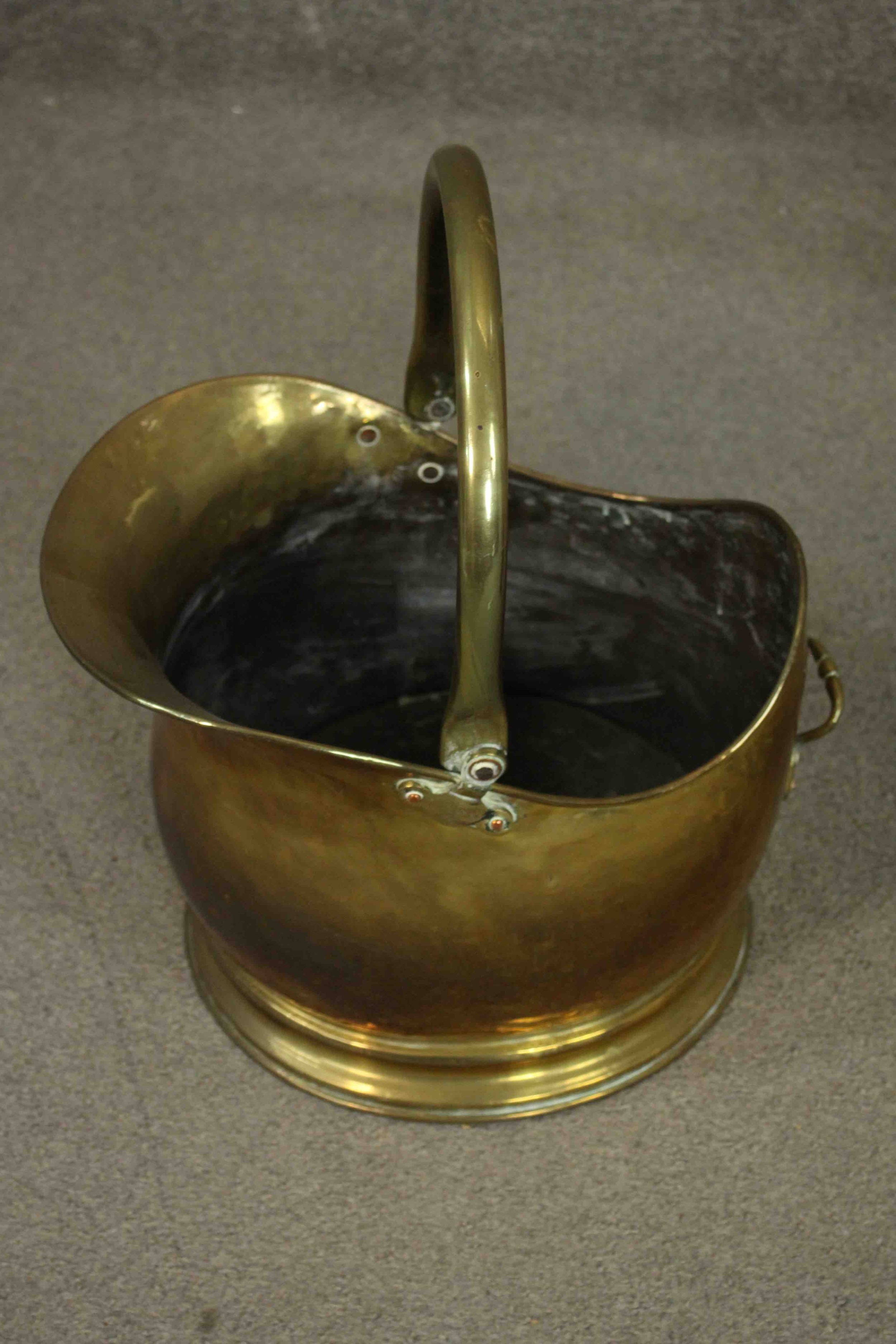 A Victorian brass coal bucket with a swing handle, together with a brass fireside companion set - Image 3 of 6