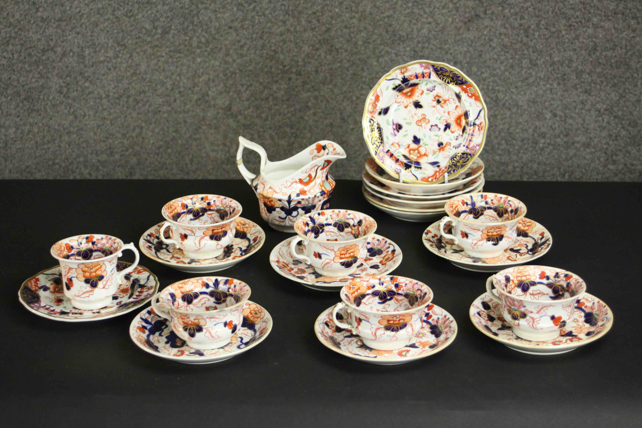 A 19th century hand painted and gilded Imari style six person part tea set. (incomplete) H.10 W.14