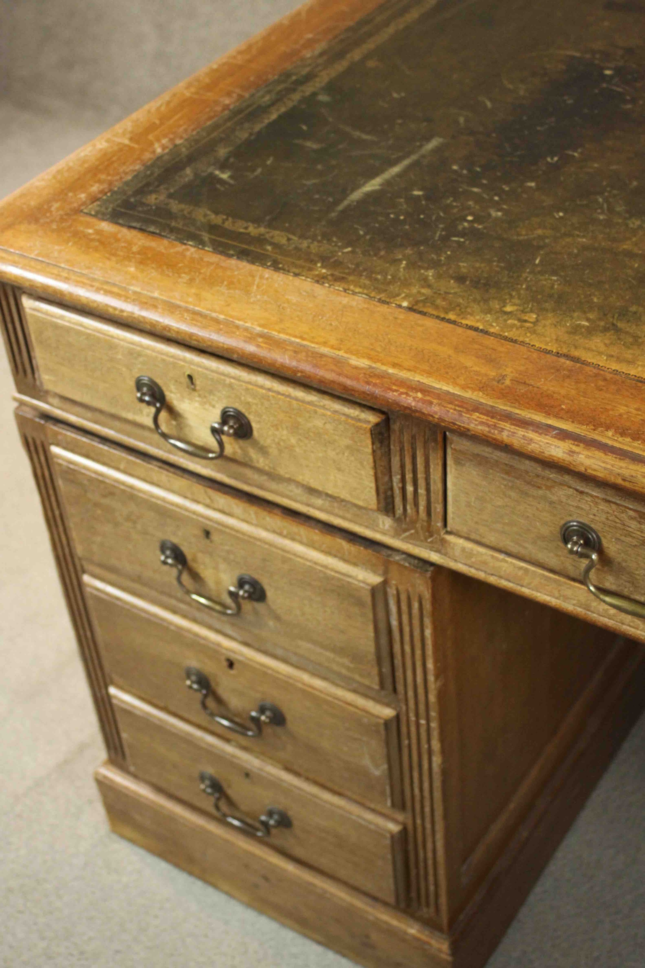 An early 20th century pedestal desk, with a leather writing insert over an arrangement of nine - Image 8 of 11