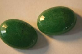 Two mixed cut treated emeralds. 7.72 carats each.