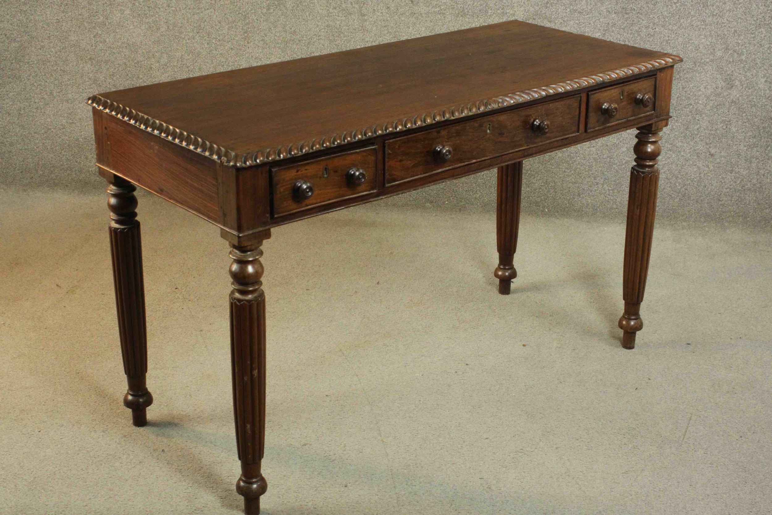A George III Anglo-Indian side table, the rectangular top with a gadrooned edge, over three short - Image 4 of 13