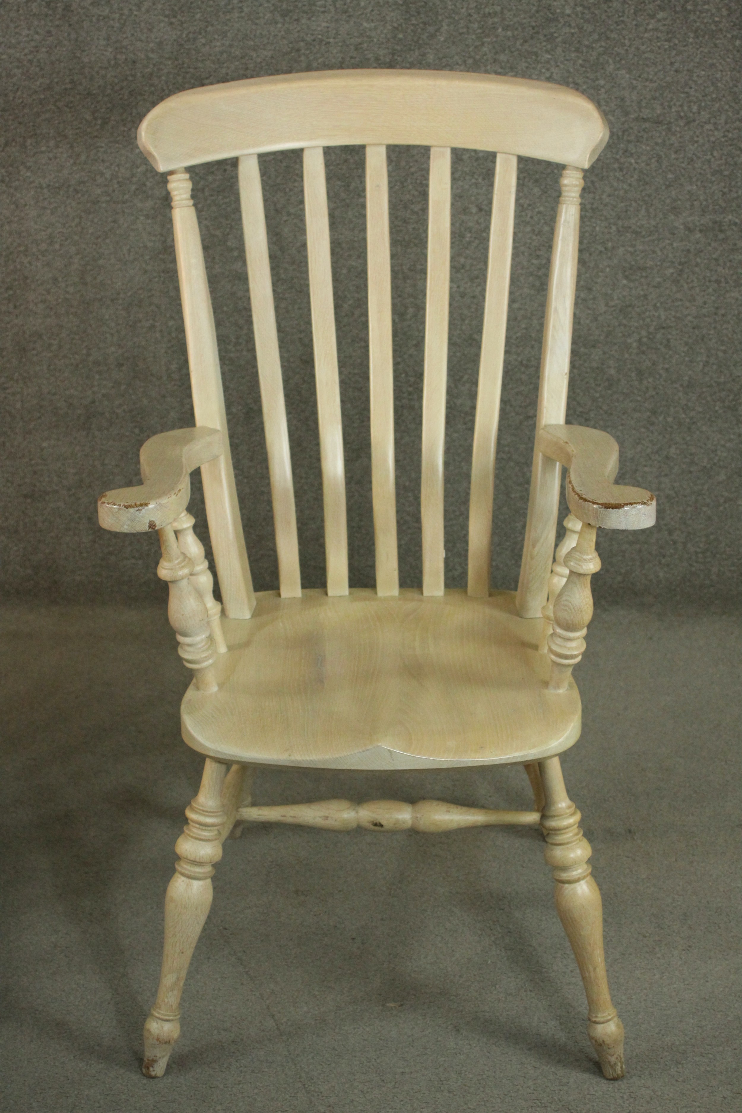 A pair of late 20th century oak Windsor carver chairs, with a comb back above a shaped seat on - Image 3 of 10