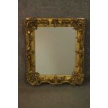 A 19th century gilt gesso framed mirror, of rectangular form. H.60 W.51cm. (Some damage as seen in