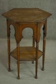 A 19th century Arts & Crafts oak Middle Eastern inspired occasional table, of hexagonal form, the