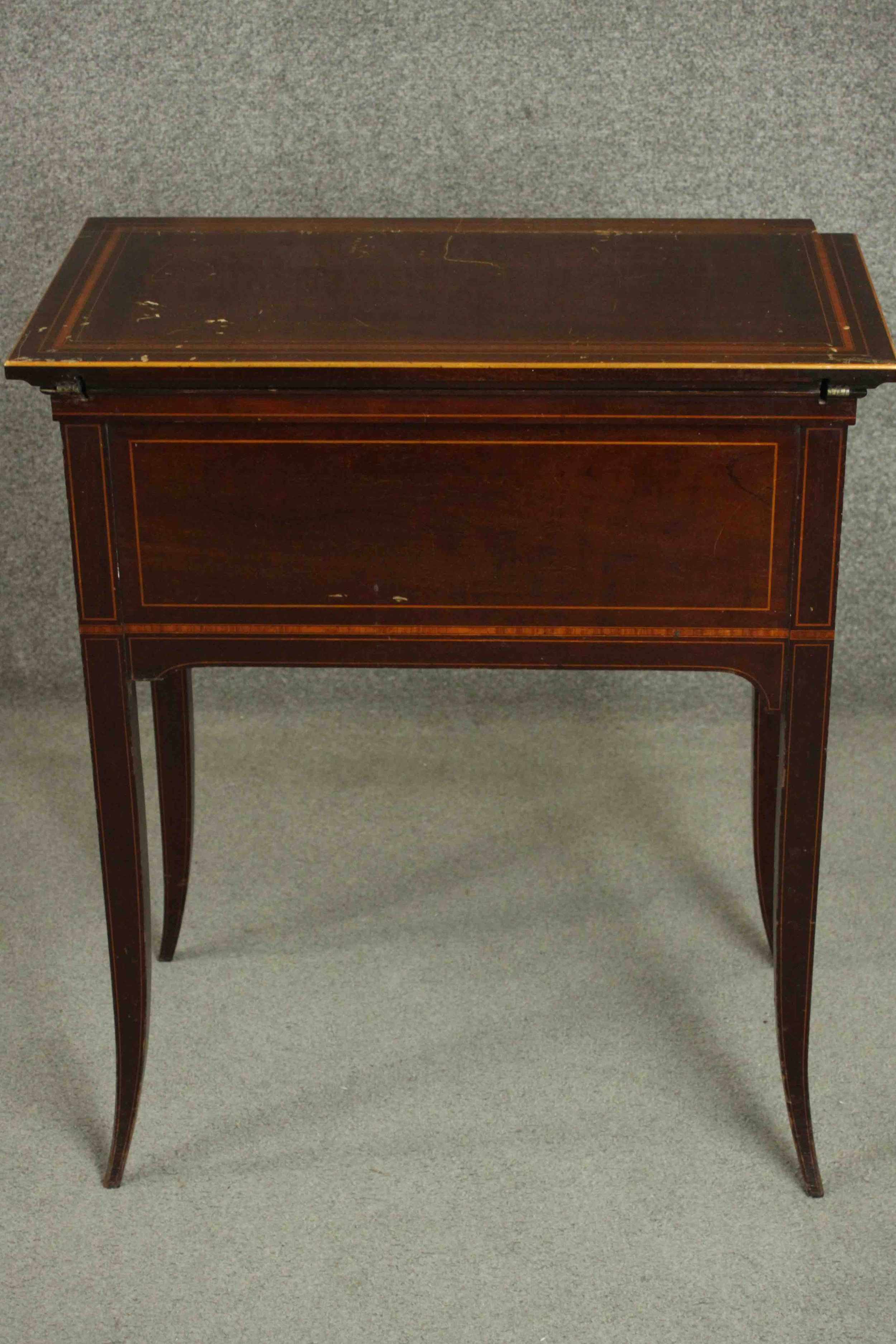 A circa 1900 mahogany and satinwood inlaid writing table, of rectangular form, the top opening to - Image 2 of 9